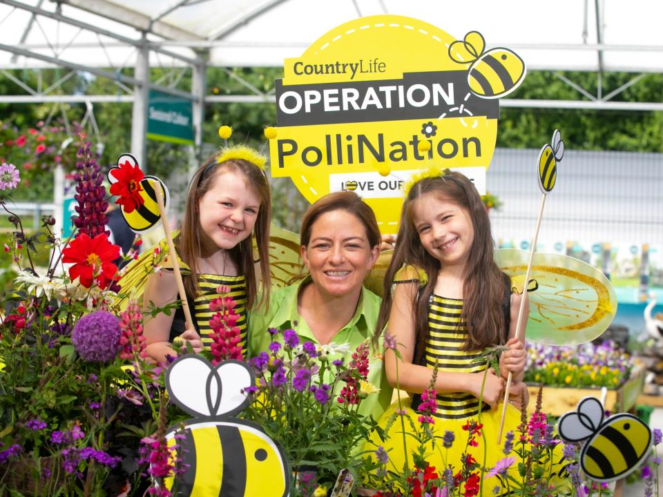 Two children and country life working launching Operation Pollination